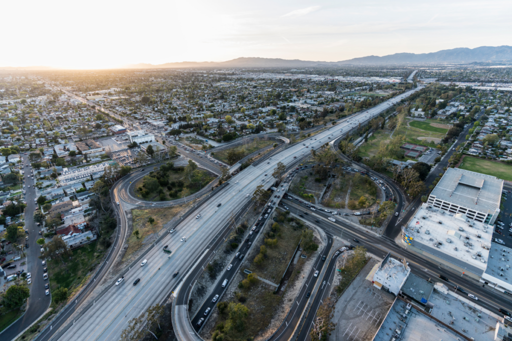Aerial view of freeway ramps and busy roadways near North Hollywood intersections